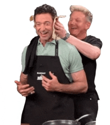 two men wearing aprons one of which says ramsay