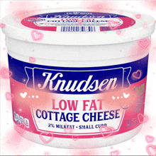 a container of low fat cottage cheese with hearts around it