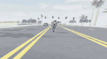 a person riding a motorcycle down a highway