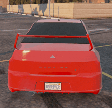 a red car with a license plate that says bbdriver on it