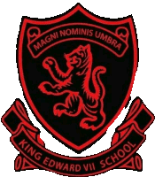 a king edward vii school logo with a red lion