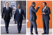 two men in suits and ties are walking together