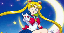 sailor moon is giving a peace sign while sitting on a crescent moon .