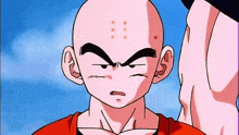 a close up of a cartoon character with a bald head and eyebrows .