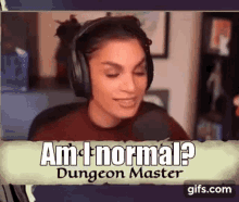 a woman wearing headphones is sitting in front of a microphone and says `` am i normal ? dungeon master '' .