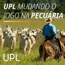 a man riding a horse in a field with the words upl mudando o jogo na pecuaria below him