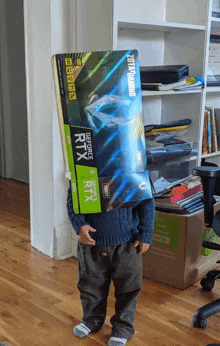 a child holding a box that says geforce rtx on it