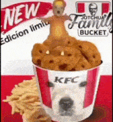 a kfc bucket with a dog on top of it