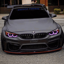 a bmw with toyo tires on the roof