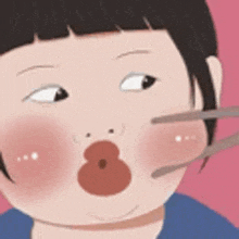 a close up of a person eating with chopsticks .