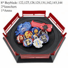 a beyblade arena with a lot of beyblades and launchers .