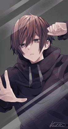 a boy in a black hoodie is behind a glass wall with his hands outstretched