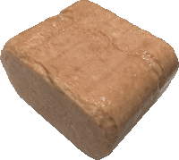 a piece of brown bread is sitting on a white background