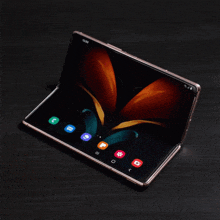 a samsung foldable phone displays the home screen