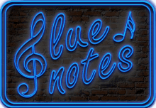 a neon sign that says " blue notes " on a brick wall