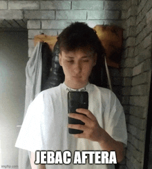 a young man taking a picture of himself with a caption that says jebac aftera