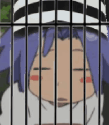 a cartoon character with blue hair is behind bars .