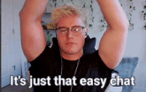 a man wearing glasses and ear buds says " it 's just that easy chat "