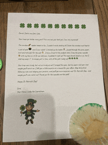 a letter with a leprechaun on it and the words happy st. patrick 's day on the bottom