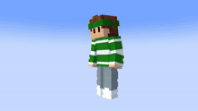 a minecraft character wearing a green and white striped shirt and headband