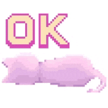 it looks like a pixel art of a cat laying down with the words `` ok '' .