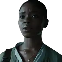 a woman wearing a necklace with a pearl on it
