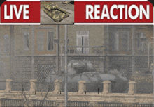 a live reaction sign with a picture of a tank in the background