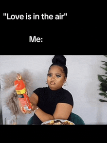 a woman is holding a spray bottle with the words " love is in the air " on it