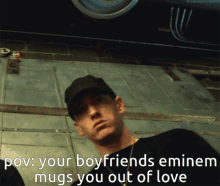 a picture of eminem with a caption that says " pov : your boyfriends eminem mugs you out of love "