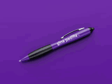 a purple and black pen with gina padilla written on it