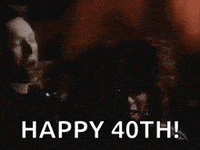 a black and white photo of a man standing in front of a drum set with the words `` happy 40th '' .