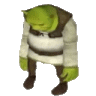 shrek from shrek is standing on a white surface .