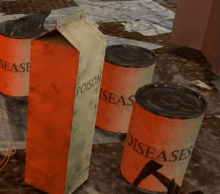 a box of poison sits next to three cans of disease