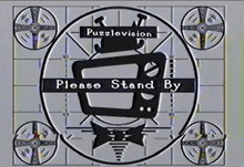 a puzzlevision logo with a tv and bow tie