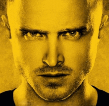 a close up of a man 's face on a yellow background