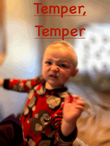 a baby making an angry face with the word temper above him