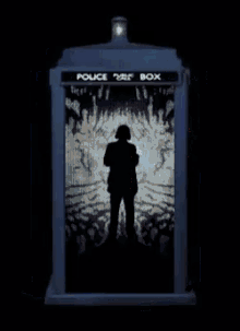 a police box with a picture of a man inside