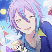 a boy with purple hair and blue streaks is smiling while holding a doll .