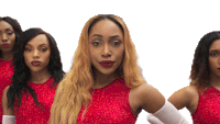 a group of women wearing red dresses and white gloves stand in a row