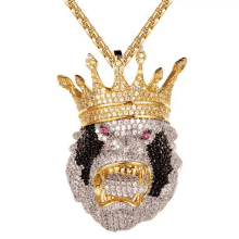 a necklace with a pendant of a lion with a crown on its head