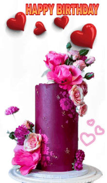 a birthday cake with pink flowers and red hearts with the words happy birthday