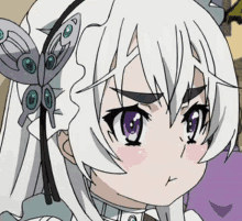 a close up of a girl with white hair and a butterfly in her hair .