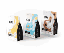 three different flavors of ctrl protein powder are displayed