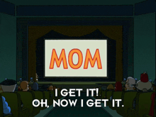 a group of people are sitting in front of a screen that says mom on it
