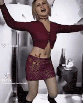 a woman in a crop top and skirt is dancing with her arms outstretched .