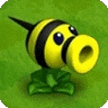 a yellow and black cartoon character is sitting on top of a green leaf .