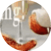 a blurred image of a glass of wine and a plate of food