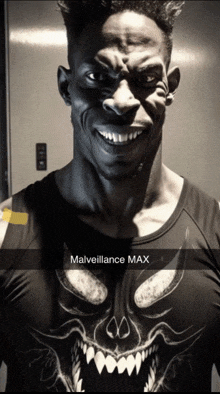 a black and white photo of a man with malveillance max written below him