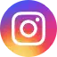 the instagram logo is in a circle with a rainbow background .