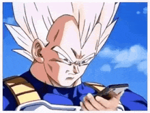 a close up of a cartoon character holding a cell phone .